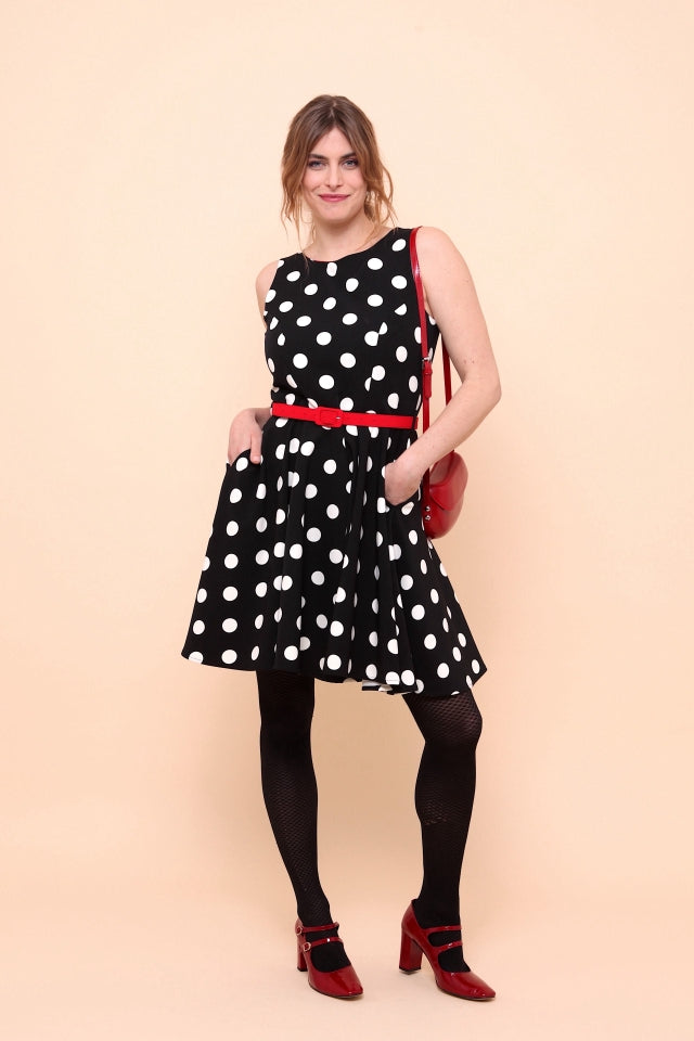Robe à pois noire silhouette élégante – HAFTER MODE